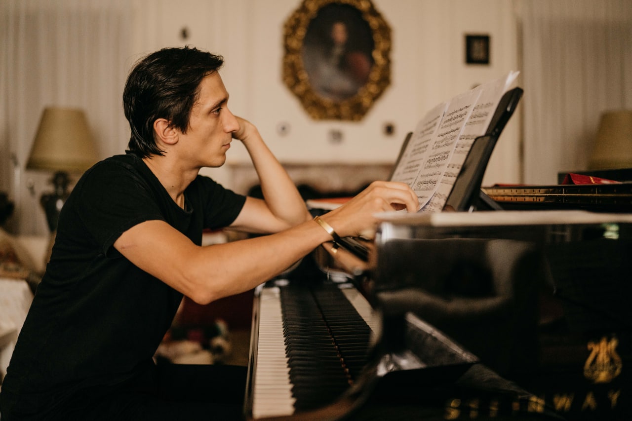Alexander Romanovsky working at the piano